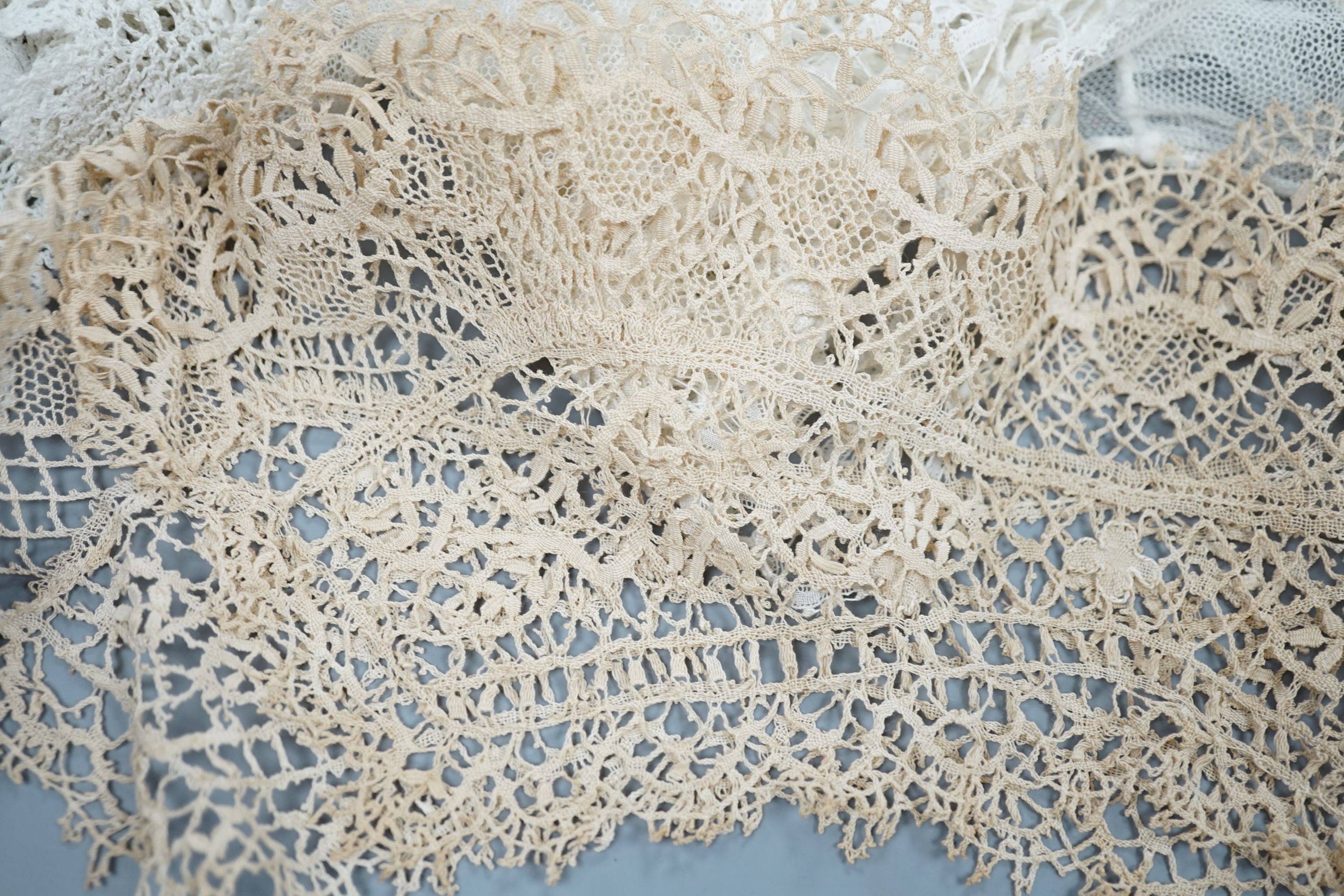 A collection of 19th century hand made bobbin lace and other handmade collars and trimmings, including Honiton, Irish crochet.